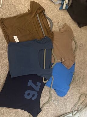 Brandy Melville mixed crop tops in brown, tan, blue, navy